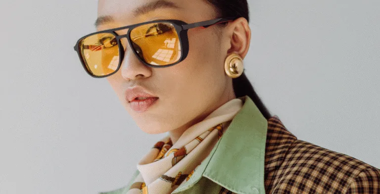 CEYGLOW side banner featuring a giant red lipstick and makeup products on sale.