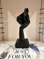 Abstract face sculpture with modern black artistic design