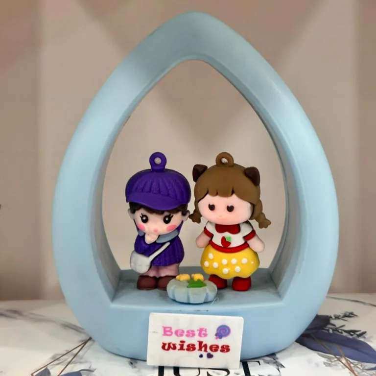Best Wishes Gift for Couple featuring cute boy and girl figurines in a glowing blue frame.