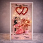 Romantic couple figurine inside LED display box with heart decor
