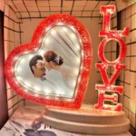Valentine's Day Photo Frame with red LED LOVE letters and illuminated heart.